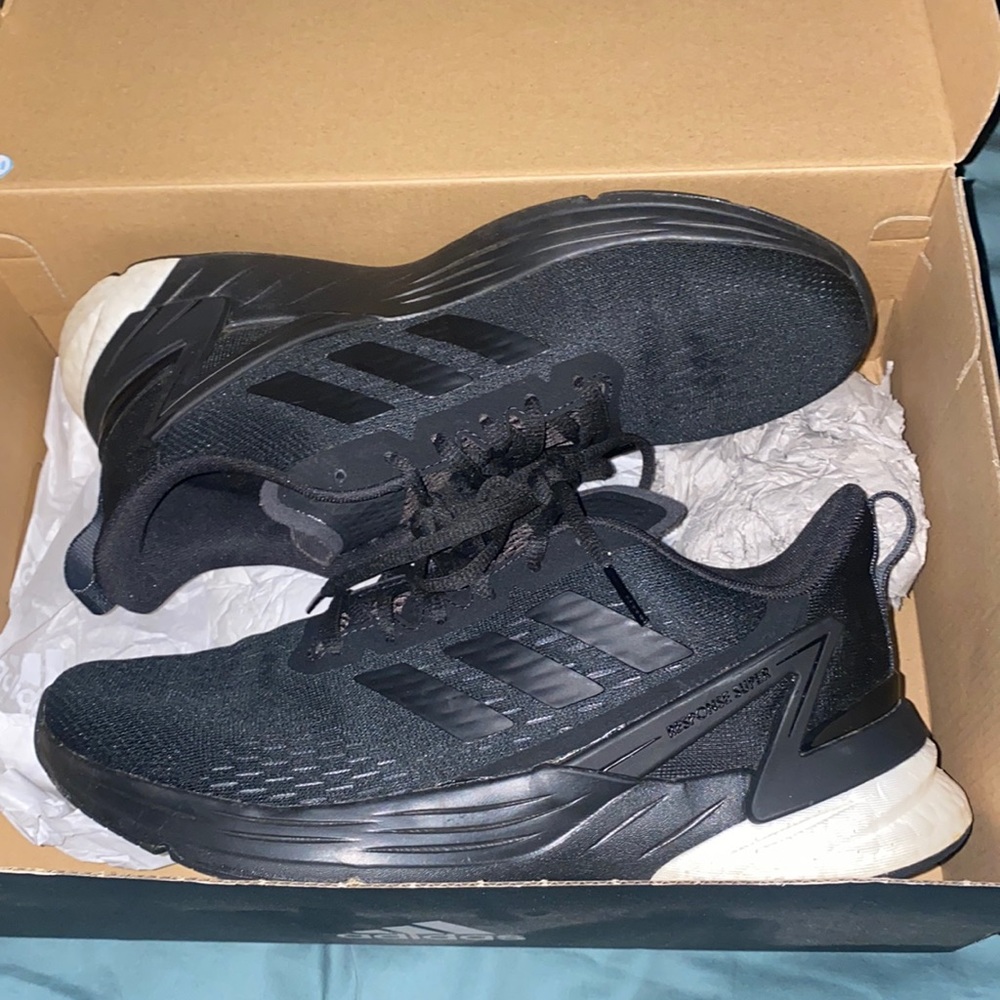 Adidas running shoe 7-1/2 I believe in men’s because I am a woman’s 9, they fit